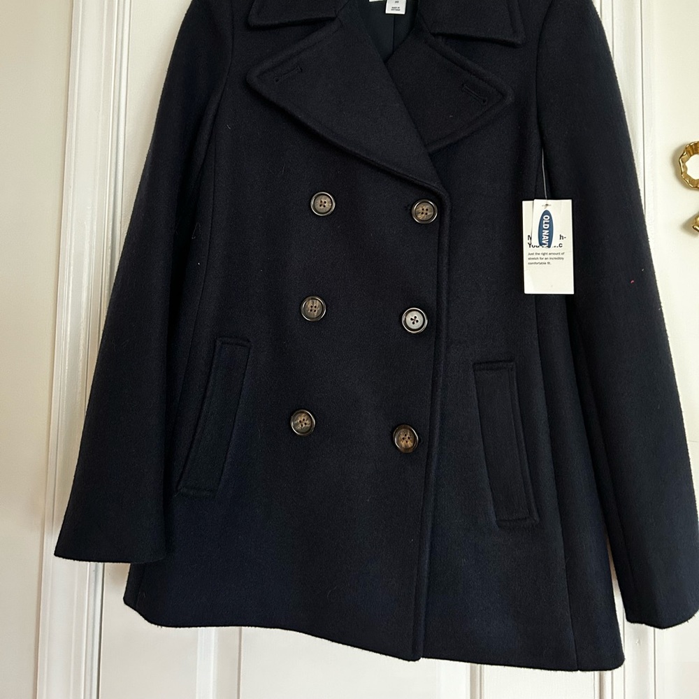 Old Navy wool blend navy pea coat. Brand new size xs.  Smoke and pet free house